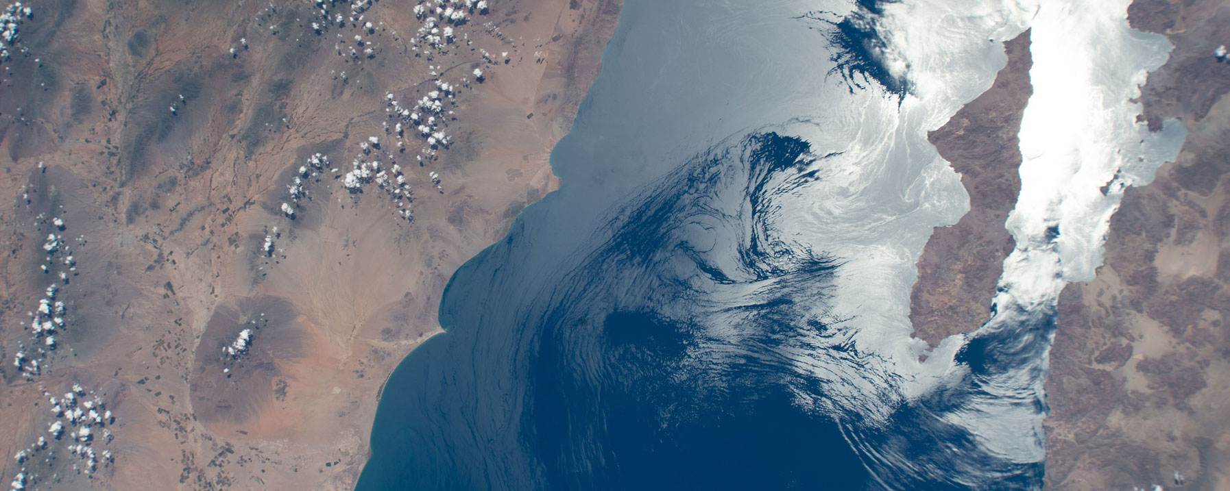 The Gulf of California reflects the sun in this photograph taken as the space station orbited 258 miles above. Archangel Island, part of the Mexican state of Baja California, seems to float in the sun’s reflection.