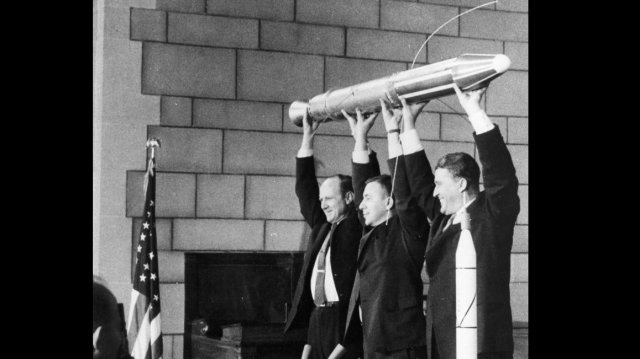JPL Director William Pickering, James Van Allen and Wernher von Braun at a Washington, D.C., news conference hold up a model of Explorer 1.