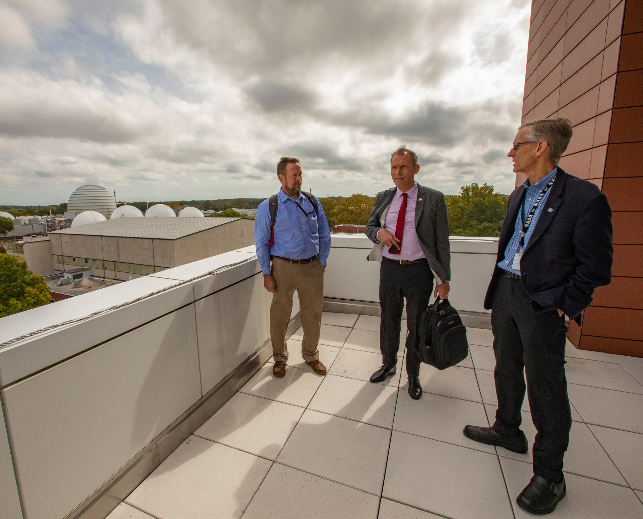 Dr. Thomas Zurbuchen visits the rooftop lab at the Measurement Systems Laboratory along with Langley's Acting Deputy Director for Flight Projects David MacDonnell, left, and Langley Deputy Center Director David Young, right.