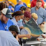 Team members at NASA’s Michoud Assembly Facility participate in an Artemis I launch party Aug. 29