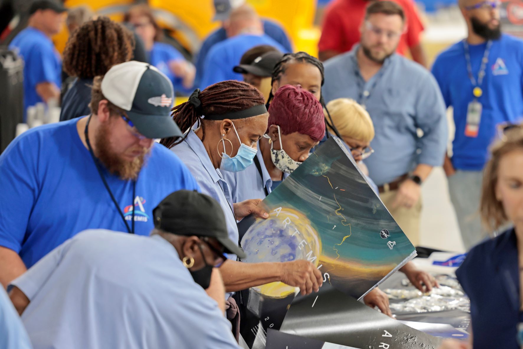 Team members at NASA’s Michoud Assembly Facility participate in an Artemis I launch party Aug. 29