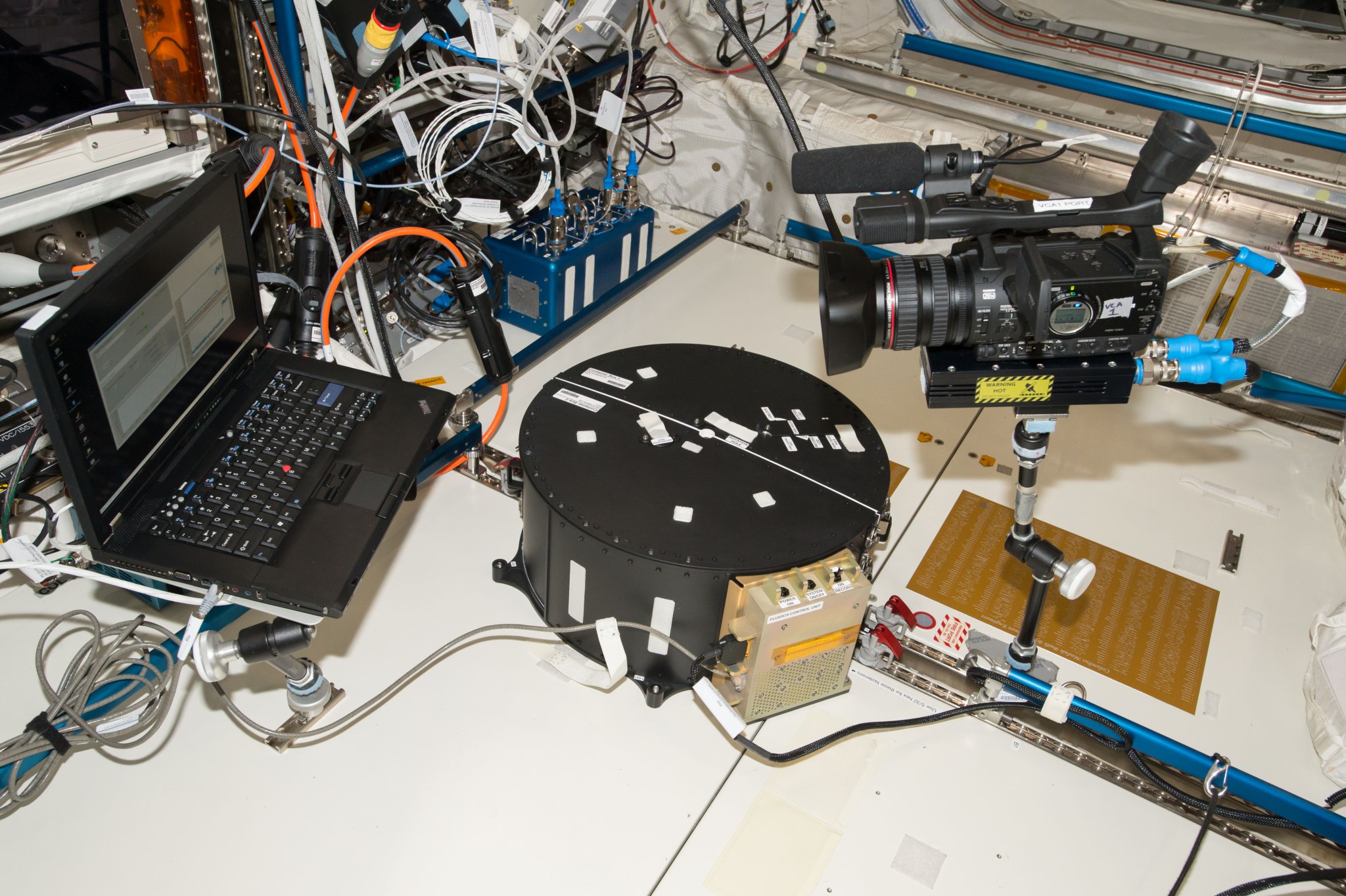 image of the hardware set-up for the ESA FLUIDICS investigation, which evaluates sloshing, turbulence, and other behaviors of liquid in a sphere in microgravity and could support improvements in fuel management of satellites.
