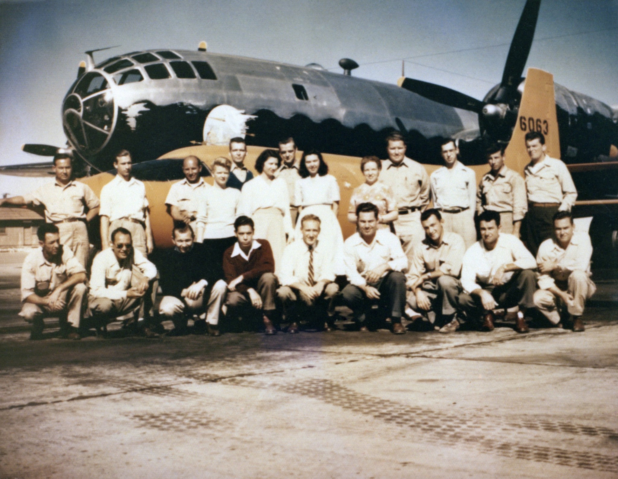 The NACA contingent in October 1947 in front of the Bell X-1-2 and Boeing B-29 launch aircraft.