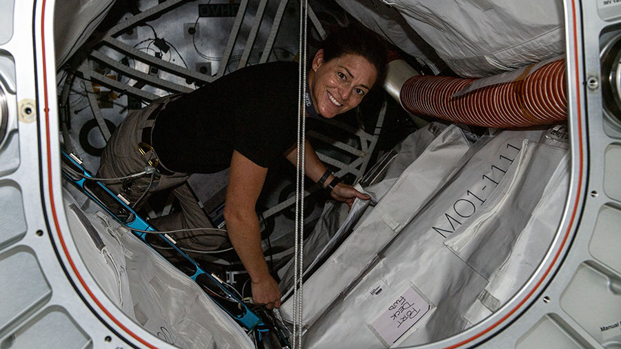NASA astronaut Nicole Mann poses inside BEAM, the Bigelow Expandable Activity Module, during cargo activities aboard the space station on Oct. 17, 2022.