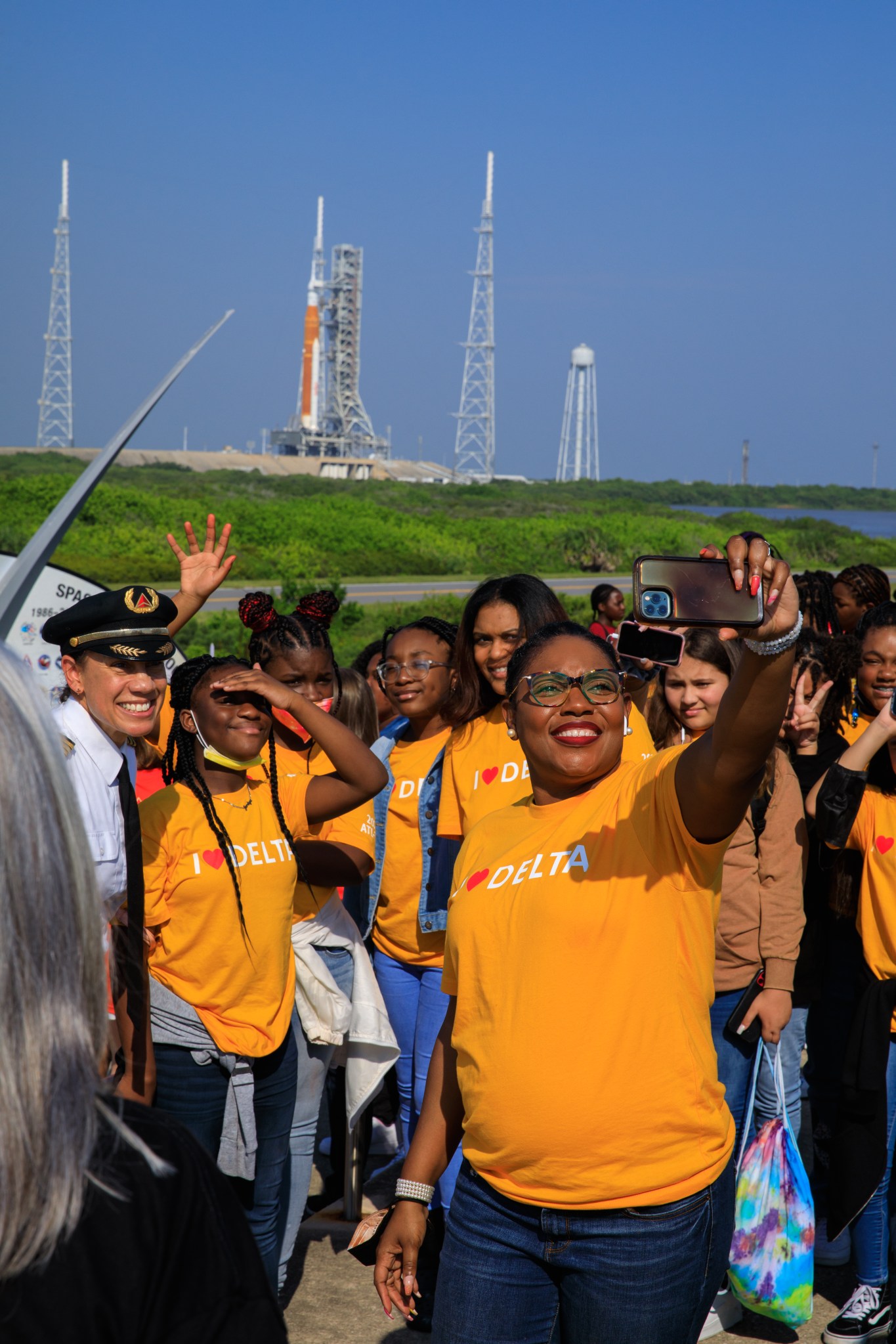 A group of girls pose for a selfie in front of NASA’s Artemis I Moon rocket at Launch Pad 39B at the agency’s Kennedy Space Center in Florida on Sept. 23, 2022. 