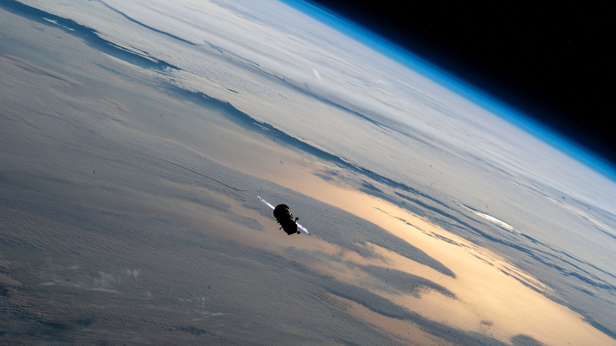 The ISS Progress 79 resupply ship from Roscosmos is pictured 261 miles above the Pacific Ocean after undocking from the Zvezda service module's rear port and departing the vicinity the International Space Station.