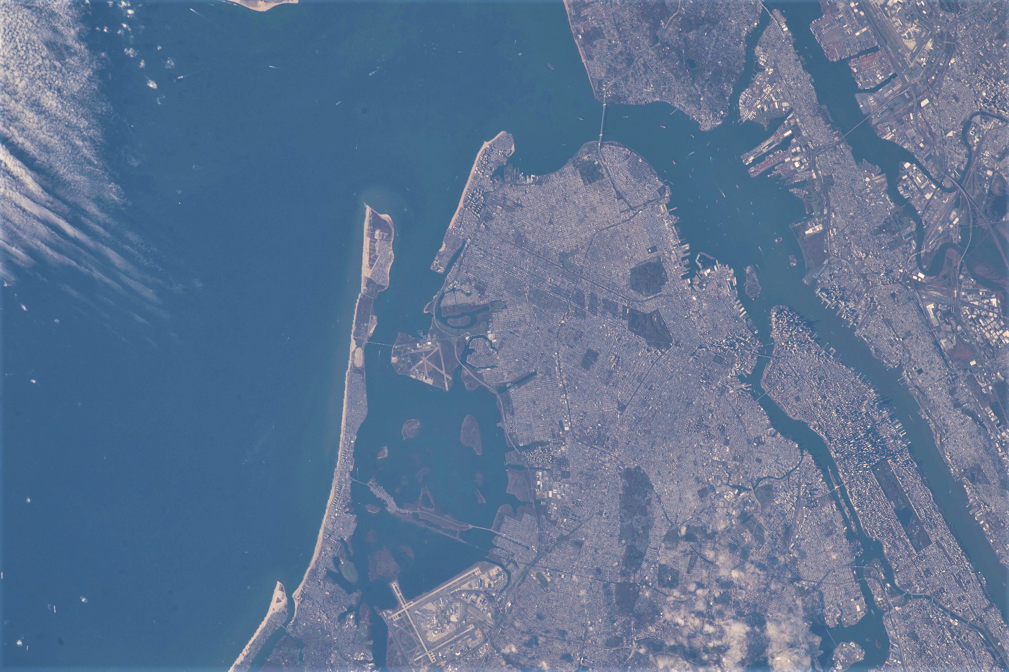This image, taken as the International Space Station orbits above the Atlantic Ocean, shows the New York City boroughs of Queens, Brooklyn, and Manhattan and portions of the Bronx and Staten Island. 