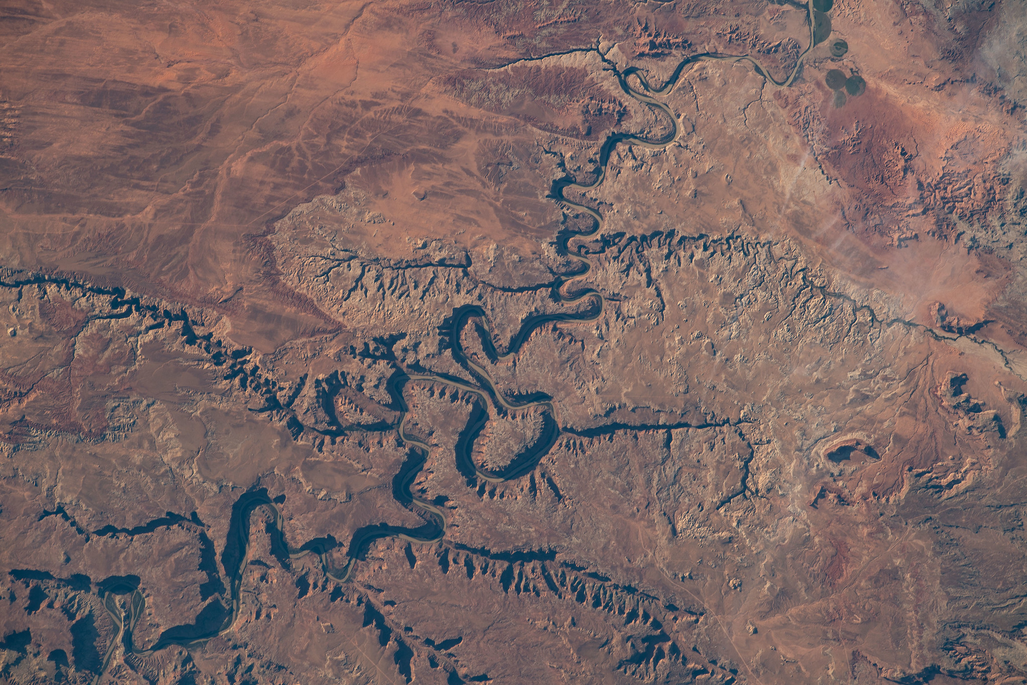 image of the Green River snakes through Canyonlands National Park near Moab, Utah, in this photograph from the International Space Station as it orbits 262 miles above. 