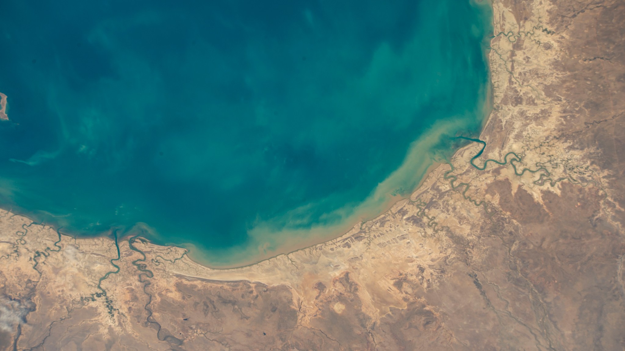 An area of the Gulf of Carpentaria on Australia’s northern coast is shown from the International Space Station in September. The SWOT satellite will measure the height of nearly all the water on Earth, including lakes, rivers, reservoirs, and the ocean. 