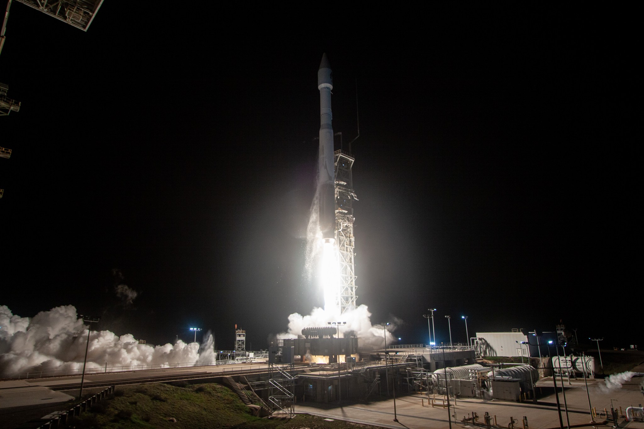 A United Launch Alliance (ULA) Atlas V rocket carrying the Joint Polar Satellite System (JPSS)-2 civilian polar-orbiting weather satellite for NOAA and NASA's LOFTID tech demo lifts off from Space Launch Complex-3 at Vandenberg Space Force Base.