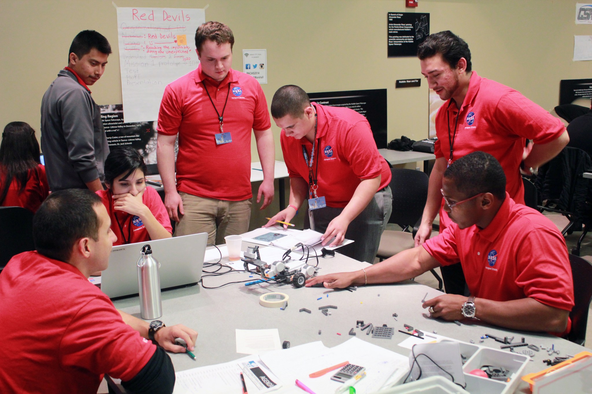 Students teams constructed a programmable robot and demonstrated its functionality on a competitive rover course.