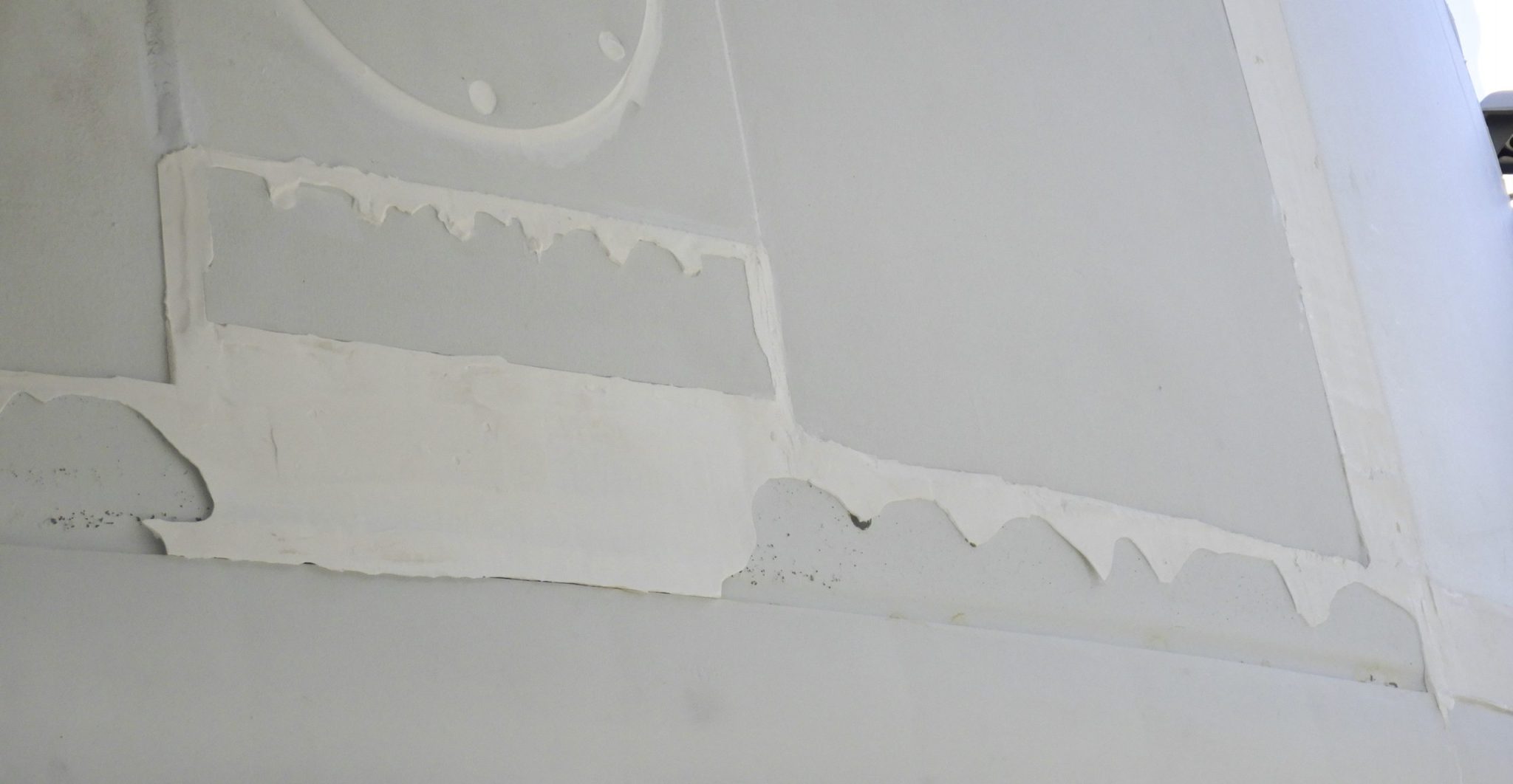 Close view of the caulk frayed during Hurricane Nicole.