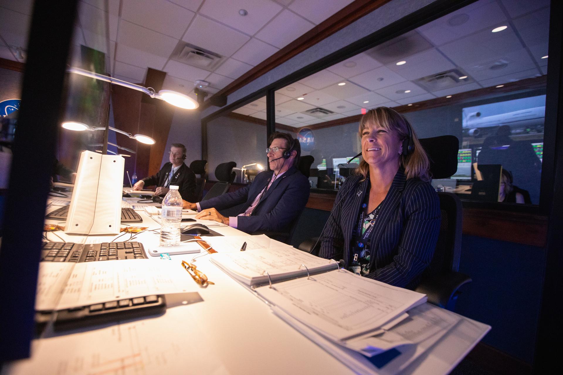 Inside Hangar AE’s Mission Director’s Center at Cape Canaveral Air Force Station (CCAFS), Amanda Mitskevich, right, program manager in NASA’s Launch Services Program, monitors the launch of the agency’s Ionospheric Connection Explorer (ICON). 