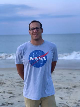 Brian Freitag, a research scientist at NASA’s Marshall Space Flight Center, at the beach.