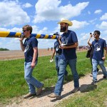 Group of students carry their rocket at the 2023 Student Launch challenge.