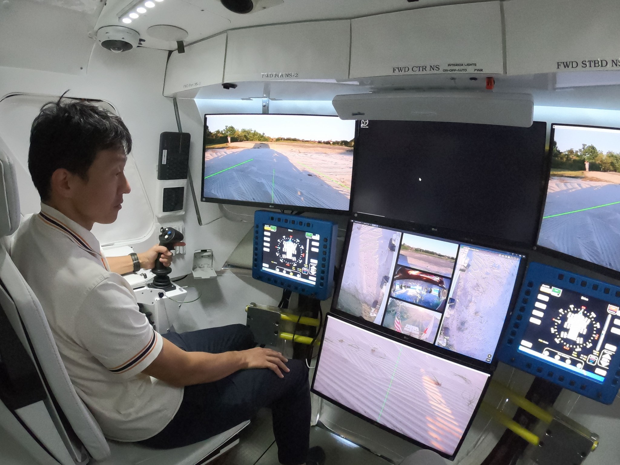 D-RATS crew member Naofumi Ikeda practices driving the rover at NASA’s Johnson Space Center prior to the analog mission.