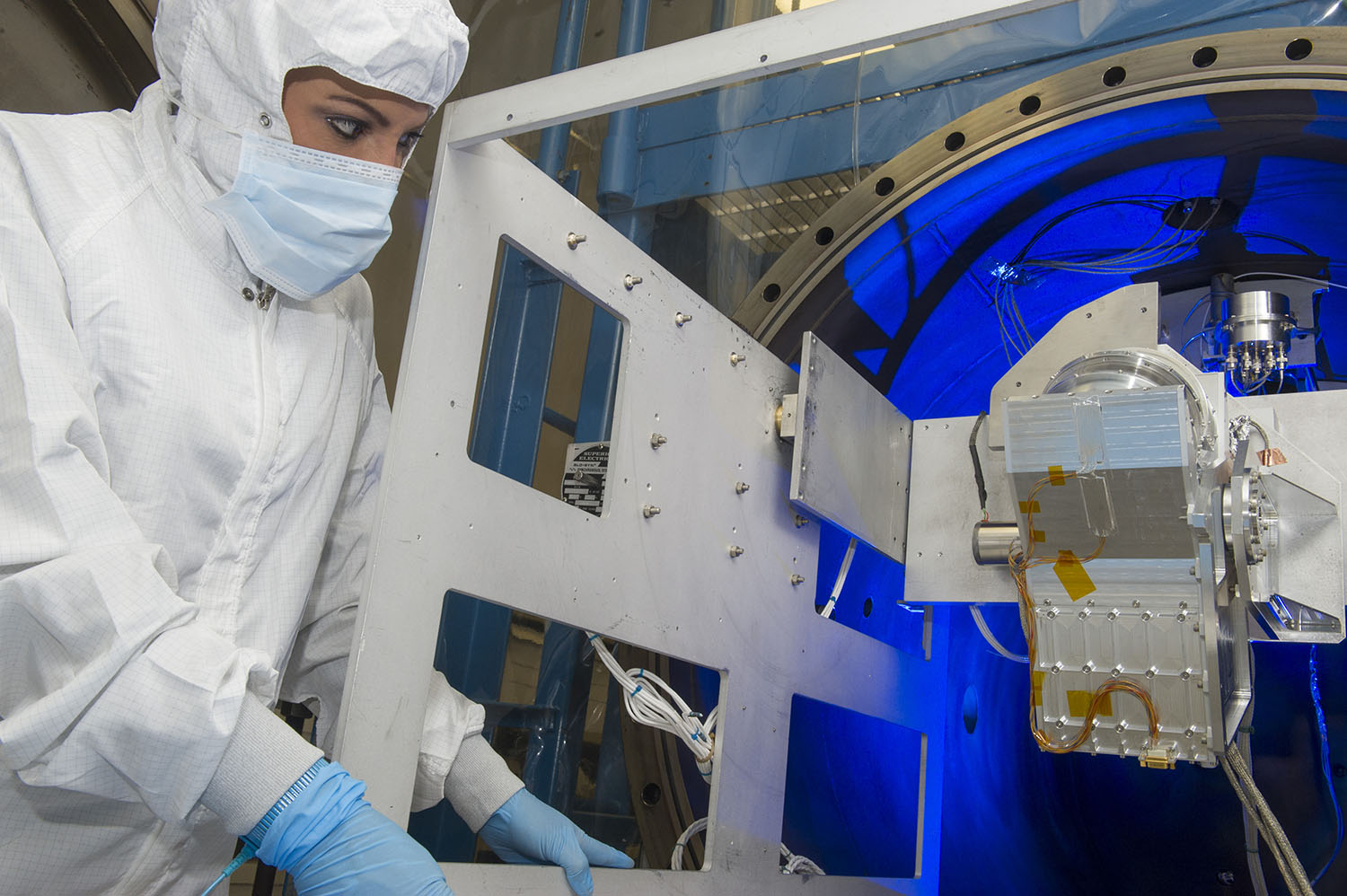 An ion spectrometers launched on the Magnetospheric Multiscale mission is tested inside a facility that simulates the space environment.