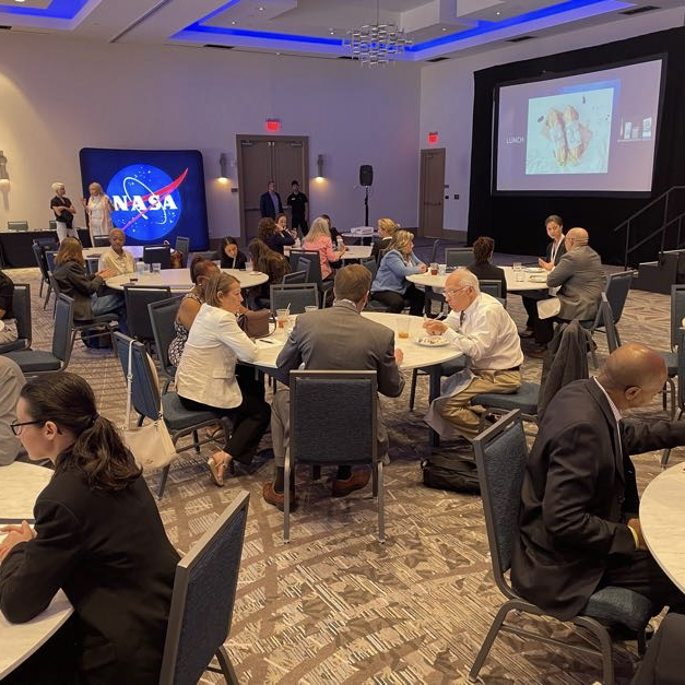 Picture of people meeting together from the HBCU/MSI Technology Infusion Road Tour