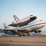 A NASA 747 takes off with the shuttle Endeavour riding on top.