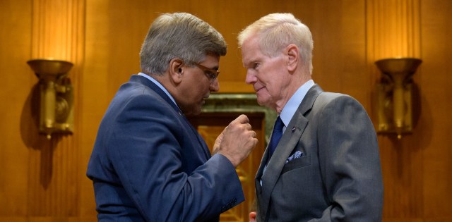 National Science Foundation Director Sethuraman Panchanathan, left, and NASA Administrator Bill Nelson talk at the conclusion of the Senate Appropriations’ Commerce, Justice, Science, and Related Agencies subcommittee budget hearing, Tuesday, April 18, 2023, at the Dirksen Senate Office Building in Washington.