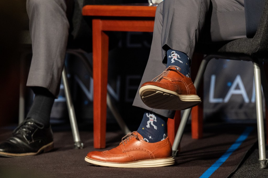 The astronaut themed socks of NASA Associate Administrator Bob Cabana are seen during a Moon to Mars Town Hall, Thursday, May 18, 2023, at the Mary W. Jackson NASA Headquarters building in Washington.