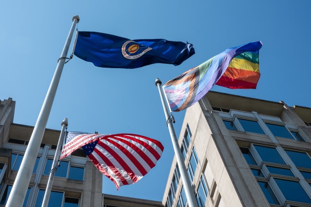 The Pride Progress Flag is seen waving in the wind at the Mary W. Jackson NASA Headquarters building in Washington.