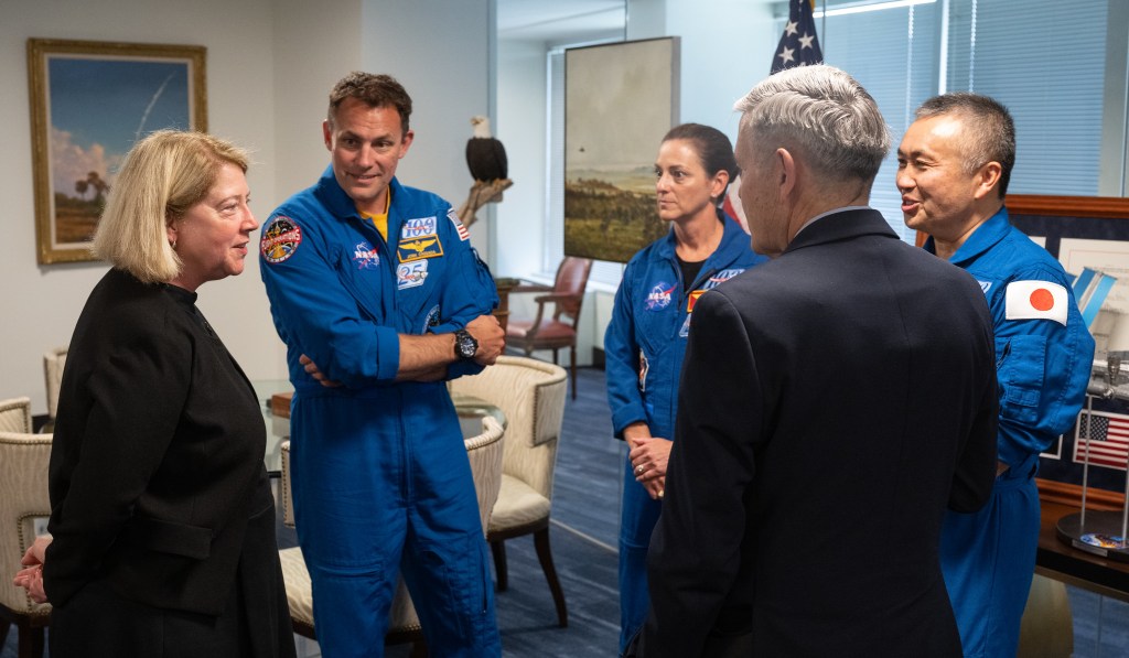 NASA Deputy Administrator Pam Melroy, left, and NASA Associate Administrator Bob Cabana, second from right, are seen with NASA’s SpaceX Crew-5 astronauts Josh Cassada, second from left, and Nicole Mann of NASA and Koichi Wakata of the Japan Aerospace Exploration Agency (JAXA), Monday, June 5, 2023 at the Mary W. Jackson NASA Headquarters building in Washington.