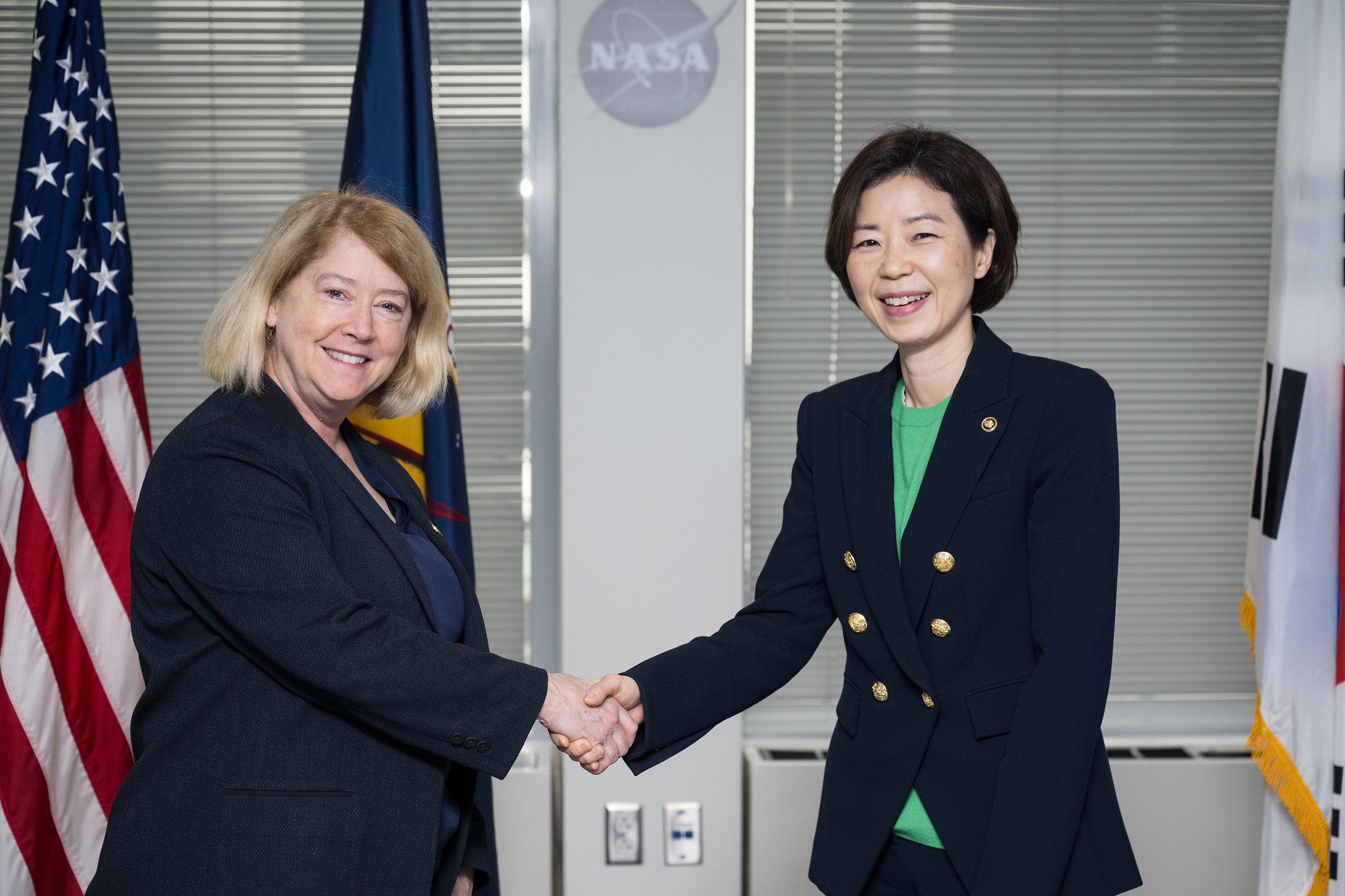 NASA Deputy Administrator Pam Melroy, left, shakes hands with Vice Minister, Ministry of Science and ICT of Korea, Seong Kyung Cho, Tuesday, Jan. 23, 2024, at the Mary W. Jackson NASA Headquarters building in Washington.