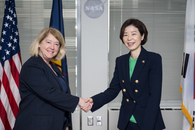 NASA Deputy Administrator Pam Melroy, left, shakes hands with Vice Minister, Ministry of Science and ICT of Korea, Seong Kyung Cho, Tuesday, Jan. 23, 2024, at the Mary W. Jackson NASA Headquarters building in Washington.