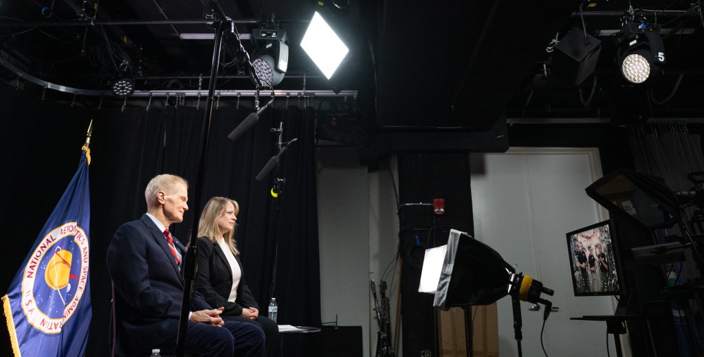 NASA Administrator Bill Nelson, left, and Lisa Carnell, director of NASA’s Biological and Physical Sciences Division are seen during an Earth-to-space call with Expedition 70 crew members Andreas Mogenson of ESA, Jasmin Moghbeli of NASA, and Satoshi Furukawa of JAXA aboard the International Space Station, visible on monitor to the right, Wednesday, Feb. 21, 2024, at the Mary W. Jackson NASA Headquarters building in Washington.