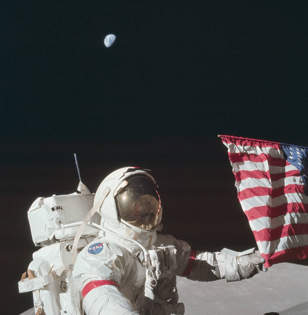 apollo_17_moon_landing_eva1_cernan_w_us_flag_earth