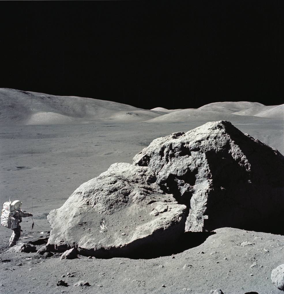 apollo_17_moon_landing_eva3_sta_6_schmitt_next_to_split_rock_w_cernan_hand_print