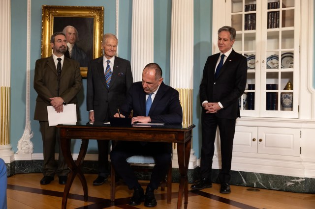 (From left) Ioannis Daglis, president of the Hellenic Space Center, NASA Administrator Bill Nelson, and U.S. Secretary of State, Antony Blinken, watch as Giorgos Gerapetritis, Greek foreign minister, signs the Artemis Accords on the margins of the U.S.-Greece Strategic Dialogue at the Department of State in Washington, Feb. 9, 2024.