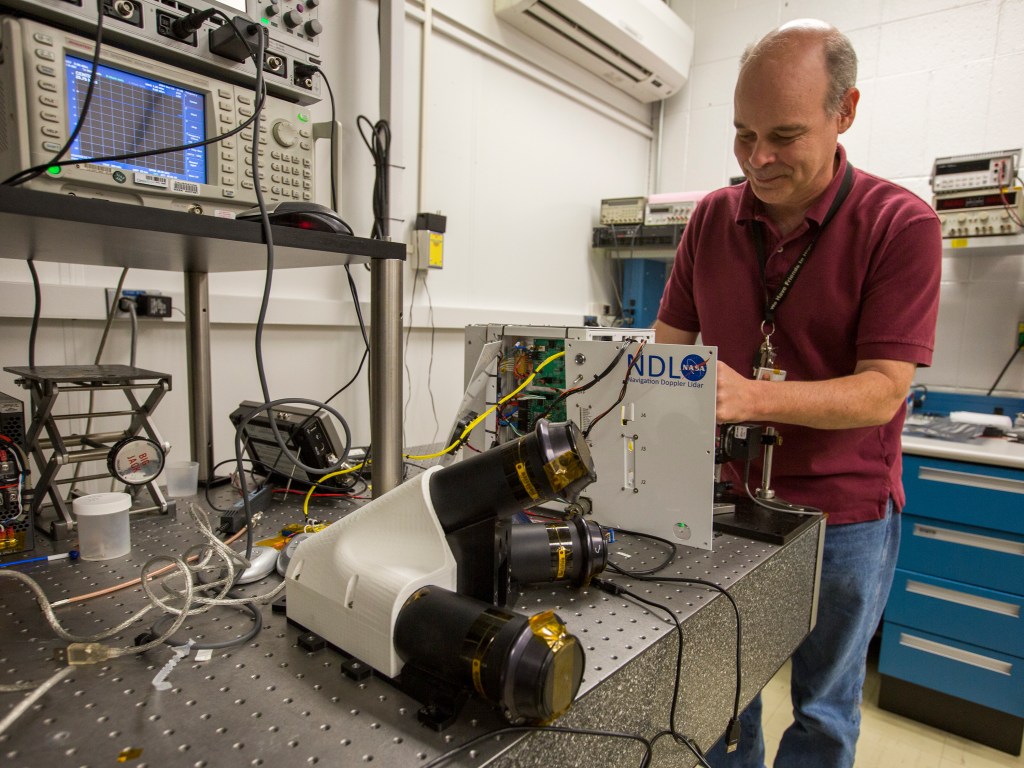 Person working on navigation doppler lidar.