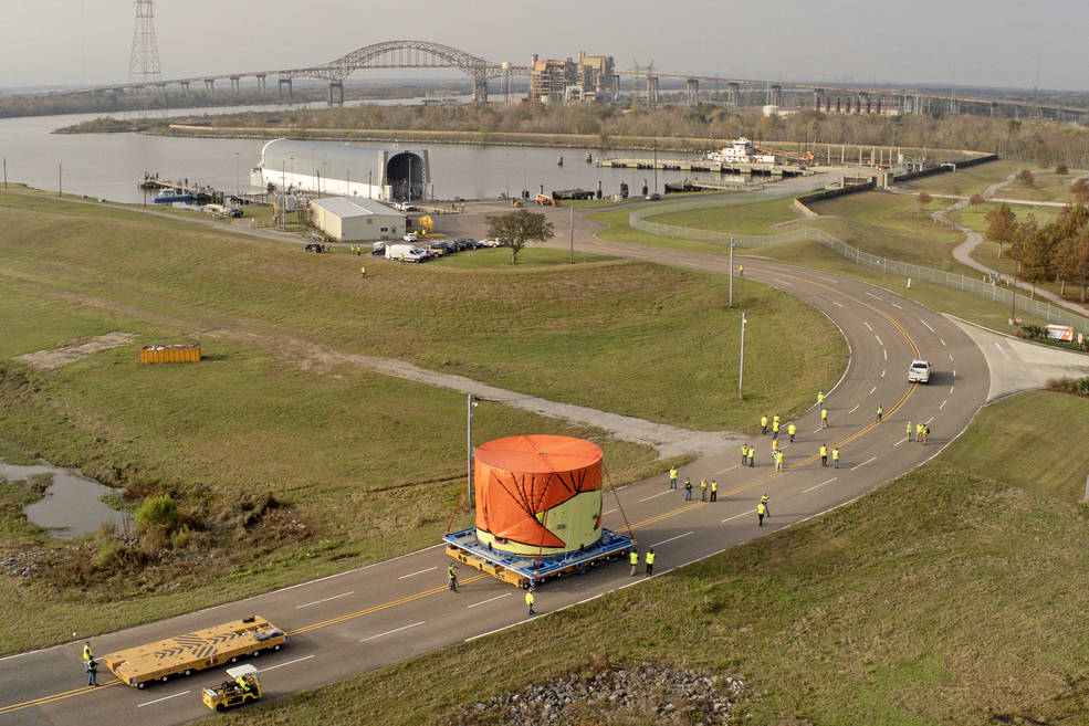 Teams at NASA’s Michoud Assembly Facility in New Orleans move the engine section flight hardware to the agency’s Pegasus barge Sunday, Dec. 4. 