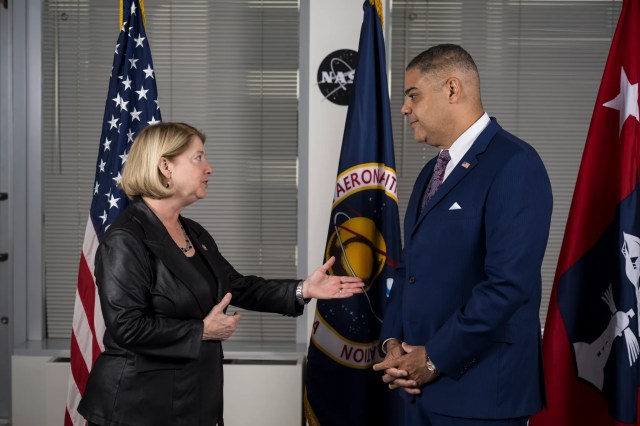 NASA Deputy Administrator Pam Melroy speaks with Under Secretary of Commerce for Minority Business Development, Donald Cravins, Jr., Tuesday, Oct. 17, 2023, at the Mary W. Jackson NASA Headquarters building in Washington.