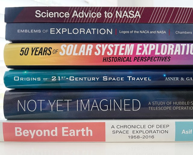 Stack of NASA History books