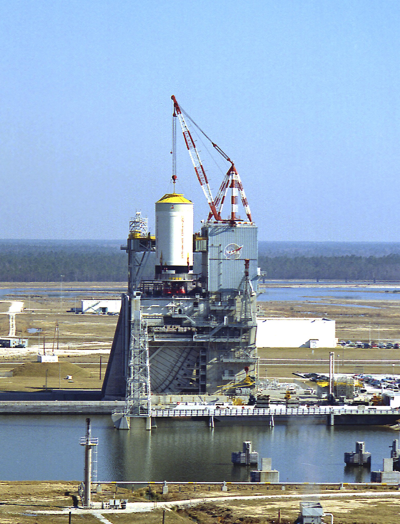 Teams at NASA’s Stennis Space Center install the Saturn V S-II-12 stage on the A-2 Test Stand on Dec. 22, 1969