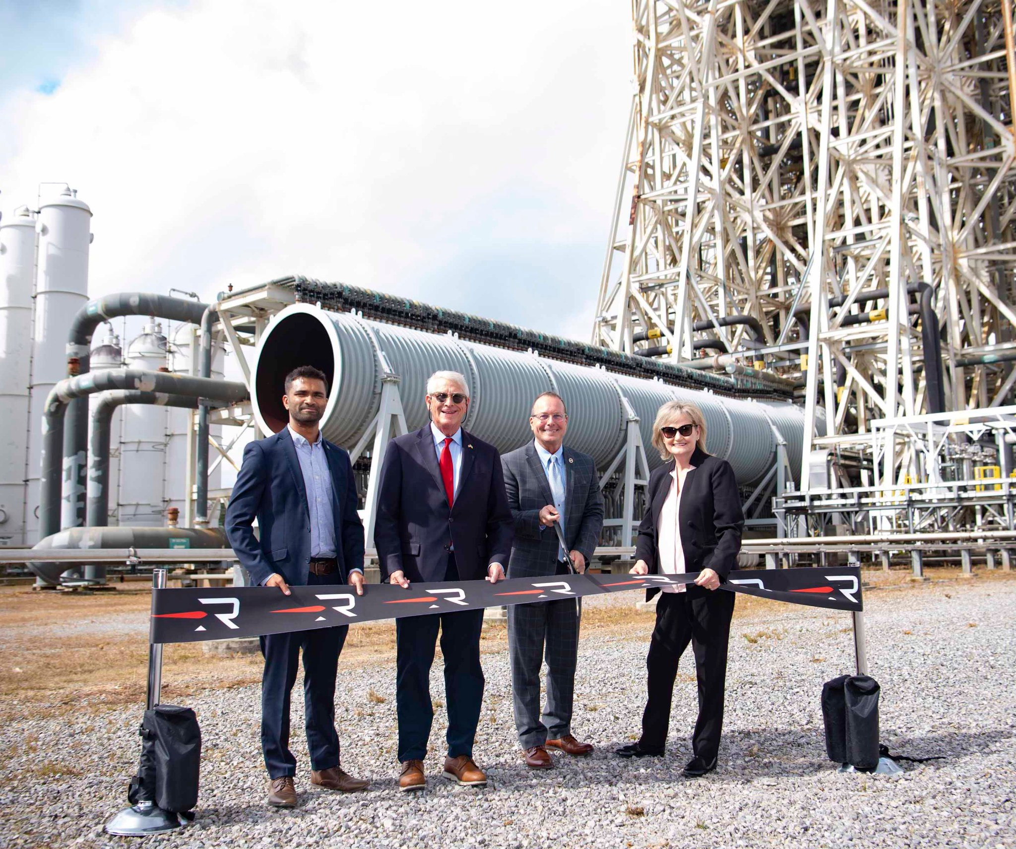 Officials cut the ribbon during a Nov. 4 ceremony marking an agreement for Rocket Lab USA to locate its new engine test complex at NASA’s Stennis Space Center