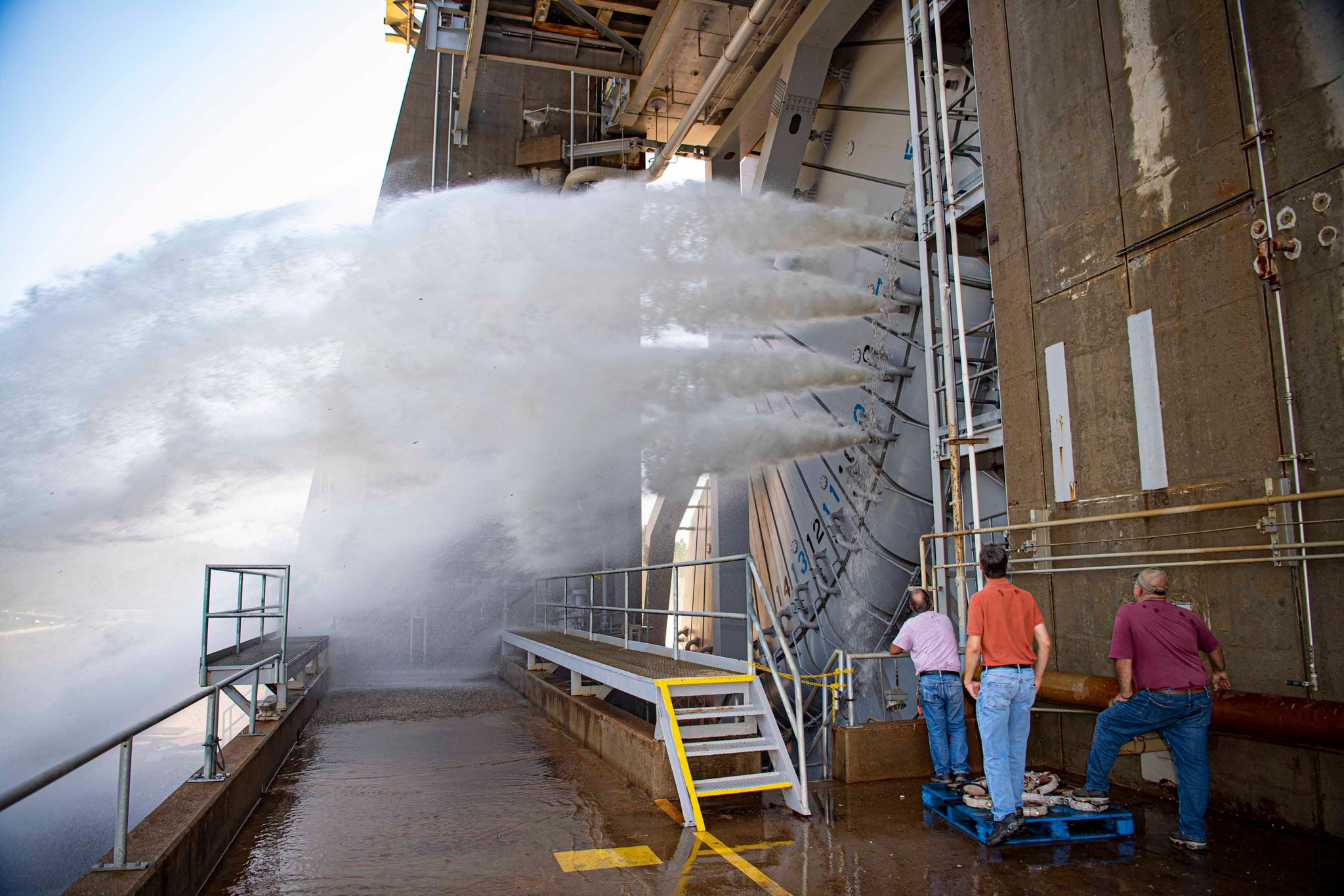 Engineers and technicians at NASA’s Stennis Space Center perform a water flush of the critical FIREX system at the Fred Haise Test Stand 