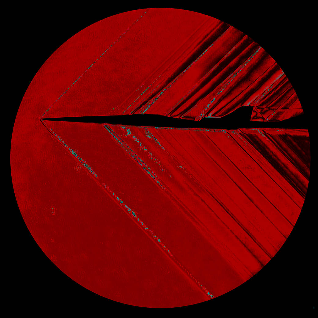 A schlieren image of the X-59 small-scale model captured inside NASA Glenn’s 8- by- 6-foot Supersonic Wind Tunnel. These images are used to predict sonic booms and verify computer-based modeling. 