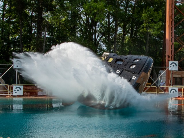 This is a photo of a splash test of the Orion capsule at NASA Langley's Hydro Impact Basin.