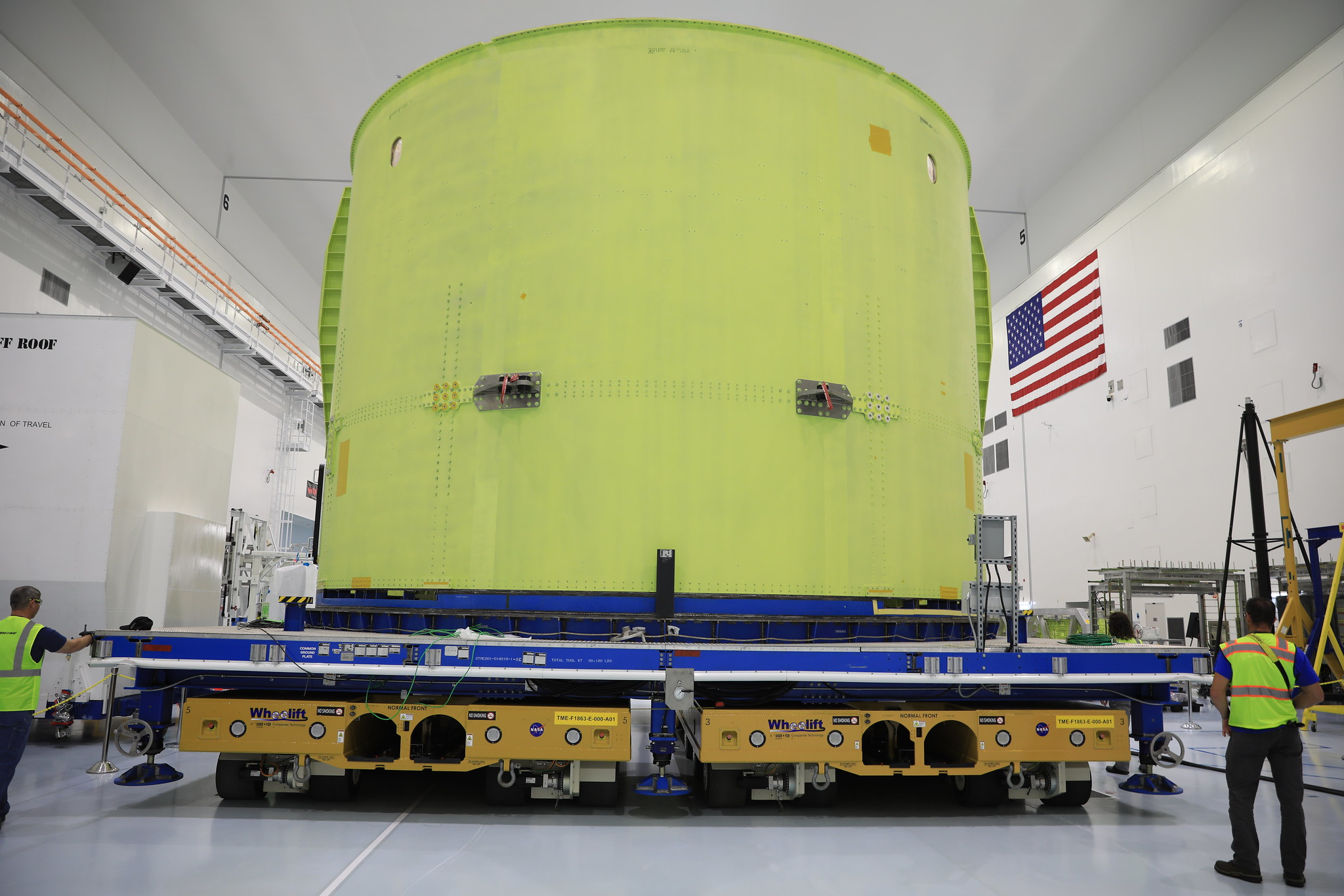 The engine section of the Space Launch System rocket’s core stage for NASA’s Artemis III mission is moved on a work stand into the high bay of the Space Station Processing Facility (SSPF) at NASA’s Kennedy Space Center in Florida on Dec. 15, 2022. 