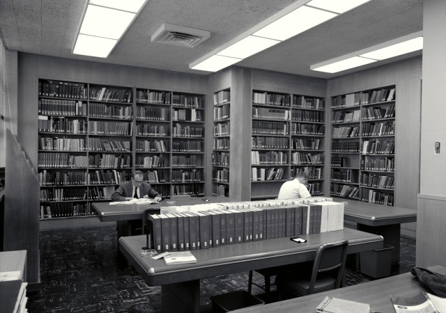 2 men work in a library at Ames Research Center.