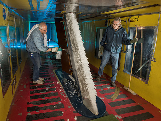 researcher working inside the icing research tunnel at NASA Glenn
