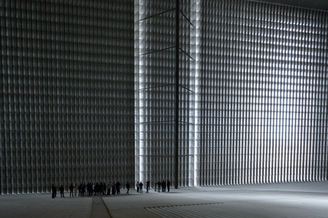 Tiny figures stand inside the football field-size air intake of the 80- by 120-foot wind tunnel at the National Full-Scale Aerodynamics Complex, located at NASA’s Ames Research Center in California’s Silicon Valley, Wednesday, Oct. 7, 2021. This photo was taken during a visit by the Blue Angels, the flight demonstration squadron of the U.S. Navy.