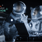 A Mock up of two astronauts standing on the moon with the logo of the Break the Ice Lunar Challenge in the left corner.