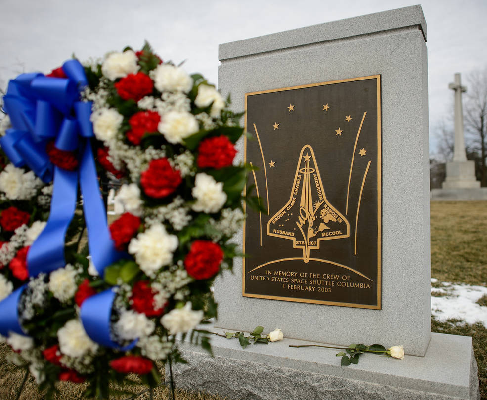 A lei is seen on the Space Shuttle Columbia Memorial after a ceremony that was part of NASA's Day of Remembrance, Thursday, Jan. 28, 2021, at Arlington National Cemetery in Arlington, Va.
