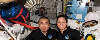 Two crew members on the ISS 