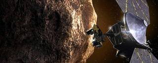 An illustration of LUCY and an asteroid in space